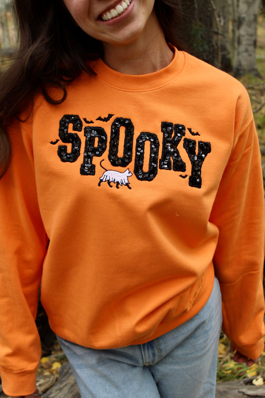 SPOOKY SEQUIN CREWNECK SWEATSHIRT IN ORANGE