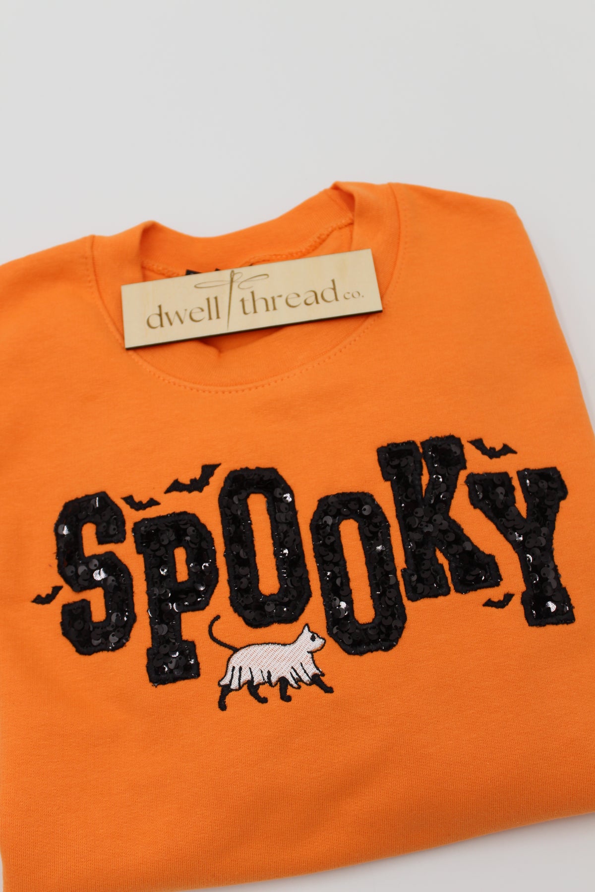 "SPOOKY" CREWNECK IN ORANGE